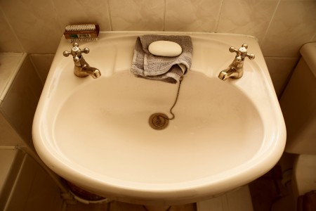 Check under the sink for any moisture